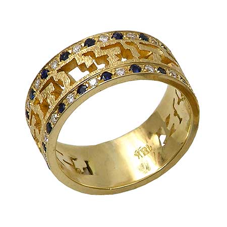 18K Gold Ring set with Diamonds and blue Sapphires