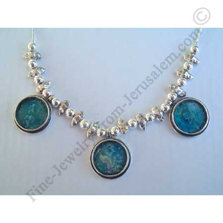delicate sterling silver necklace with assorted silver beads and 3 Roman glass pendants