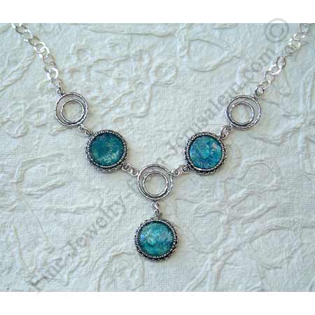 delicate ethnic design in silver necklace with fantasy dimension silver links and Roman glass