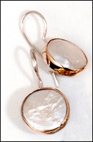 Silver and Gold earrings  set with mother of pearl