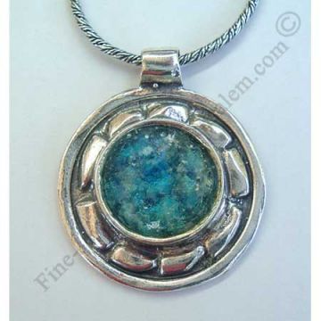 abstract design in sterling slver round pendant set with Roman glass