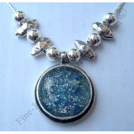 delicate sterling silver round necklace with assorted silver beads and Roman glass
