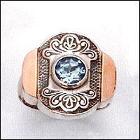 Silver and Gold ring set with Blue Topaz